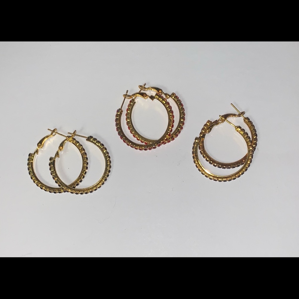 3 sets of gold earrings with colored stones